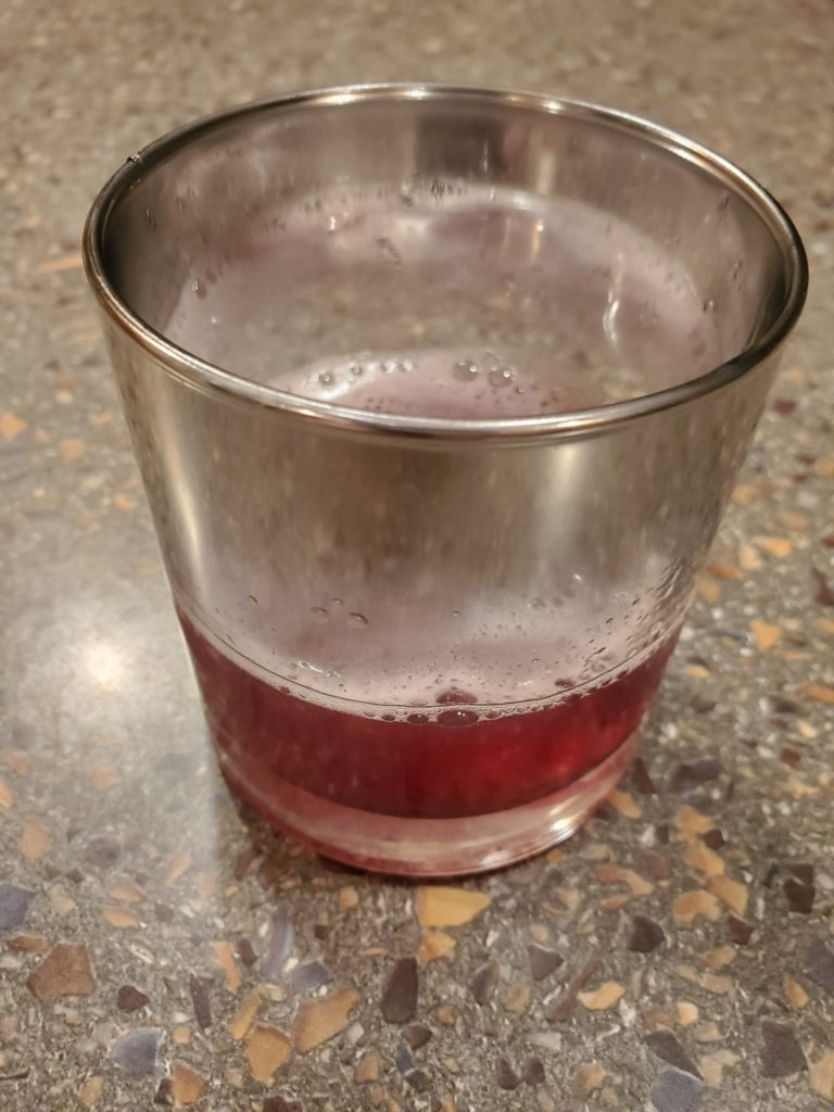 cocktail glass with bourbon cocktail